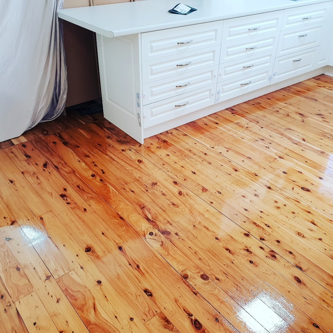 Freshly coated Cypress pine timber floors ready for aftercare