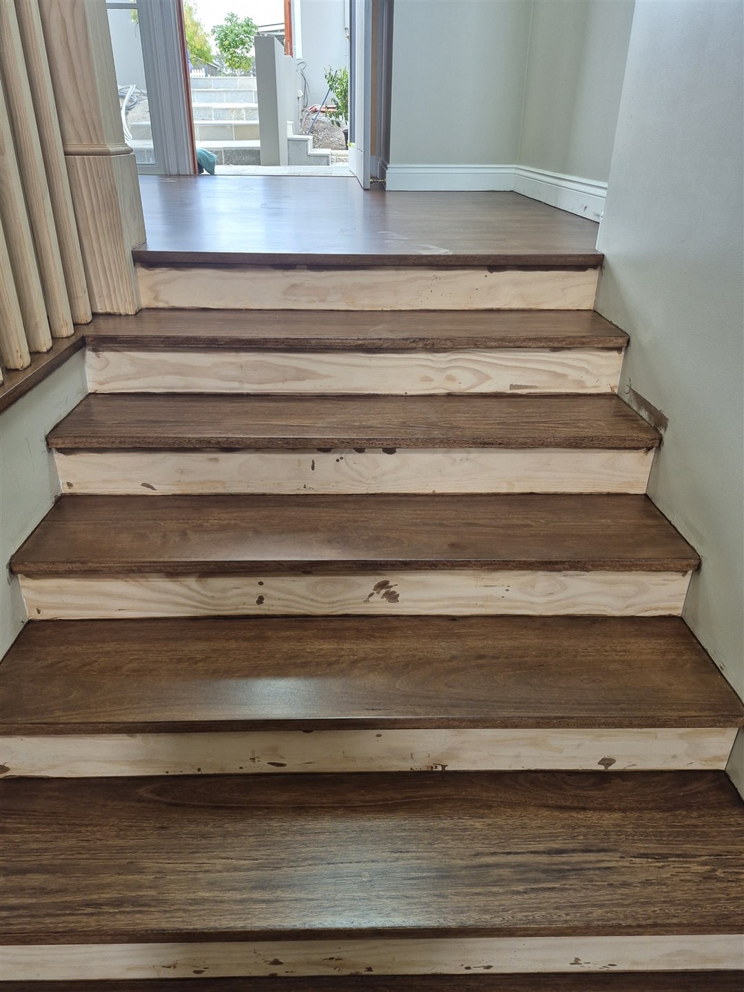 Stained blackbutt steps leading down, Brisbane