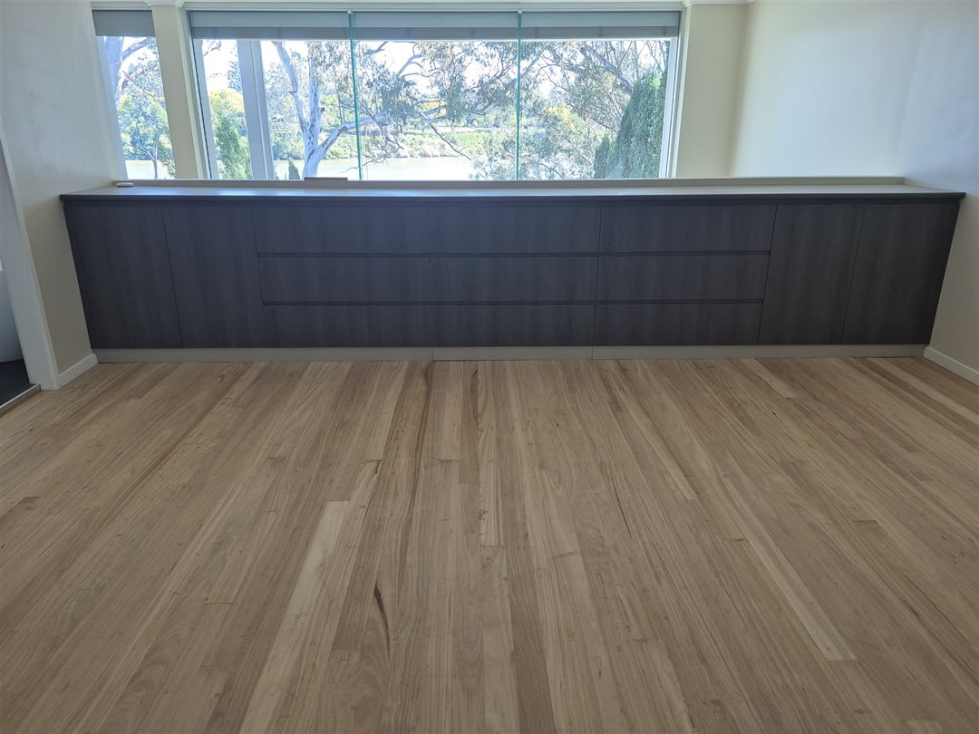 Room with window and low cabinet on blackbutt, Brisbane