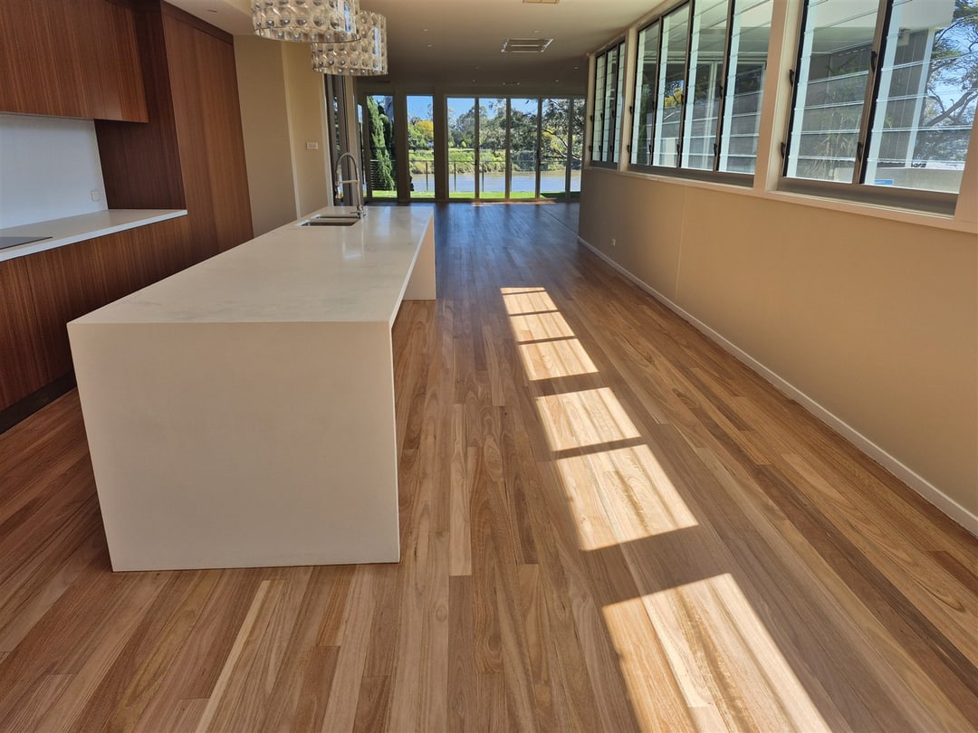Kitchen island over the blackbutt floor, Brisbane