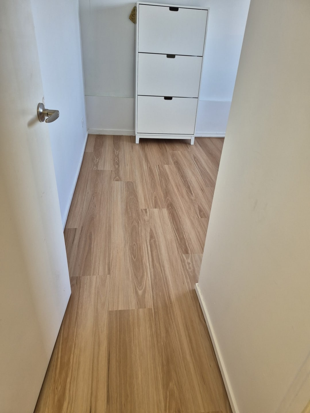 Narrow hallway in blackbutt-look vinyl, Brisbane