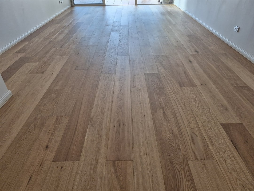 Engineered oak boards down the length of the room, Brisbane