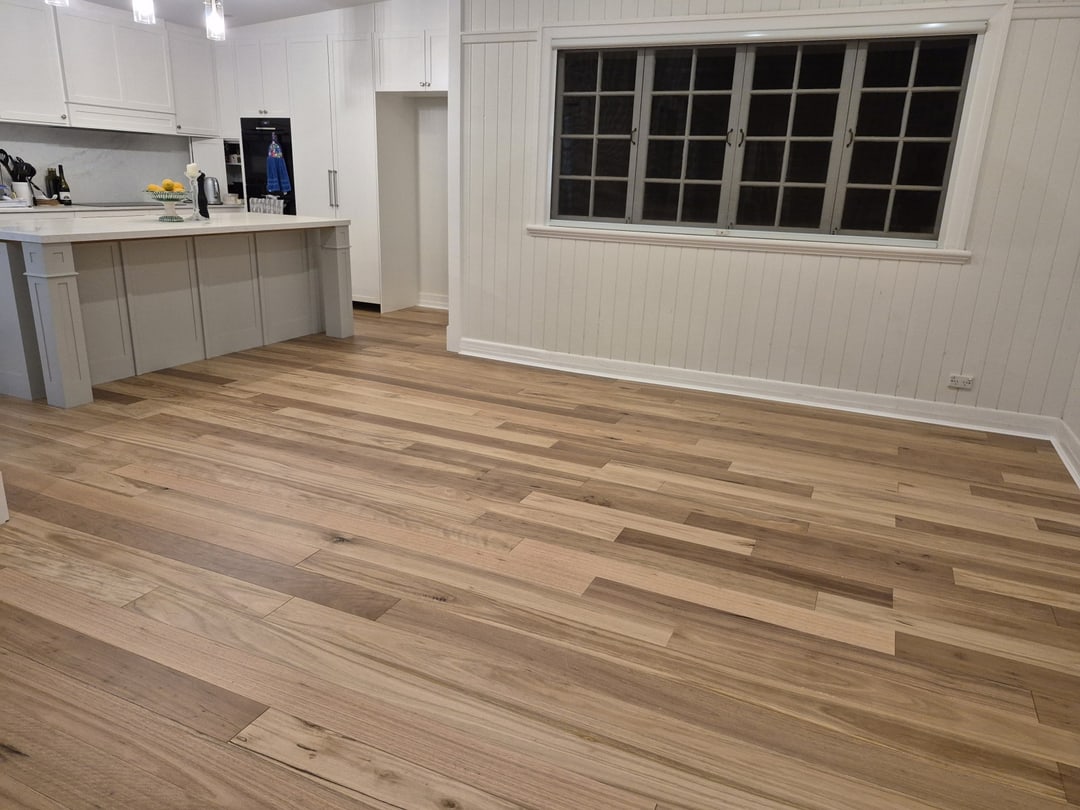 Prefinished blackbutt running the length of the open-plan room, Sandgate, Brisbane