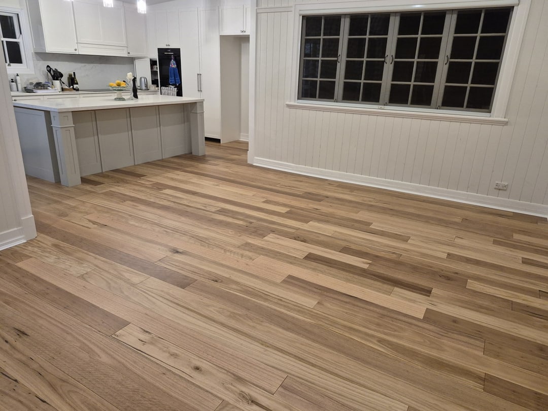 Kitchen and living space with natural blackbutt flooring, Sandgate, Brisbane
