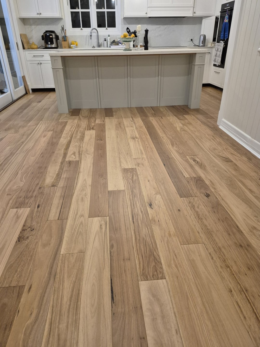 Blackbutt floor leading to the kitchen island, Sandgate, Brisbane