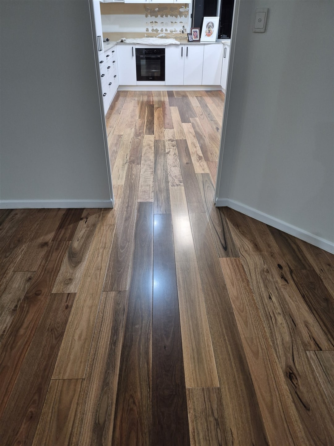 Spotted gum hallway leading to the kitchen, Brisbane