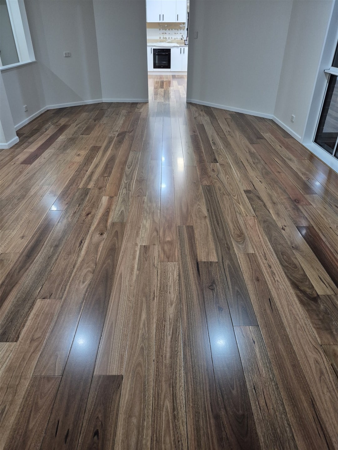 Spotted gum boards running toward the kitchen, Brisbane