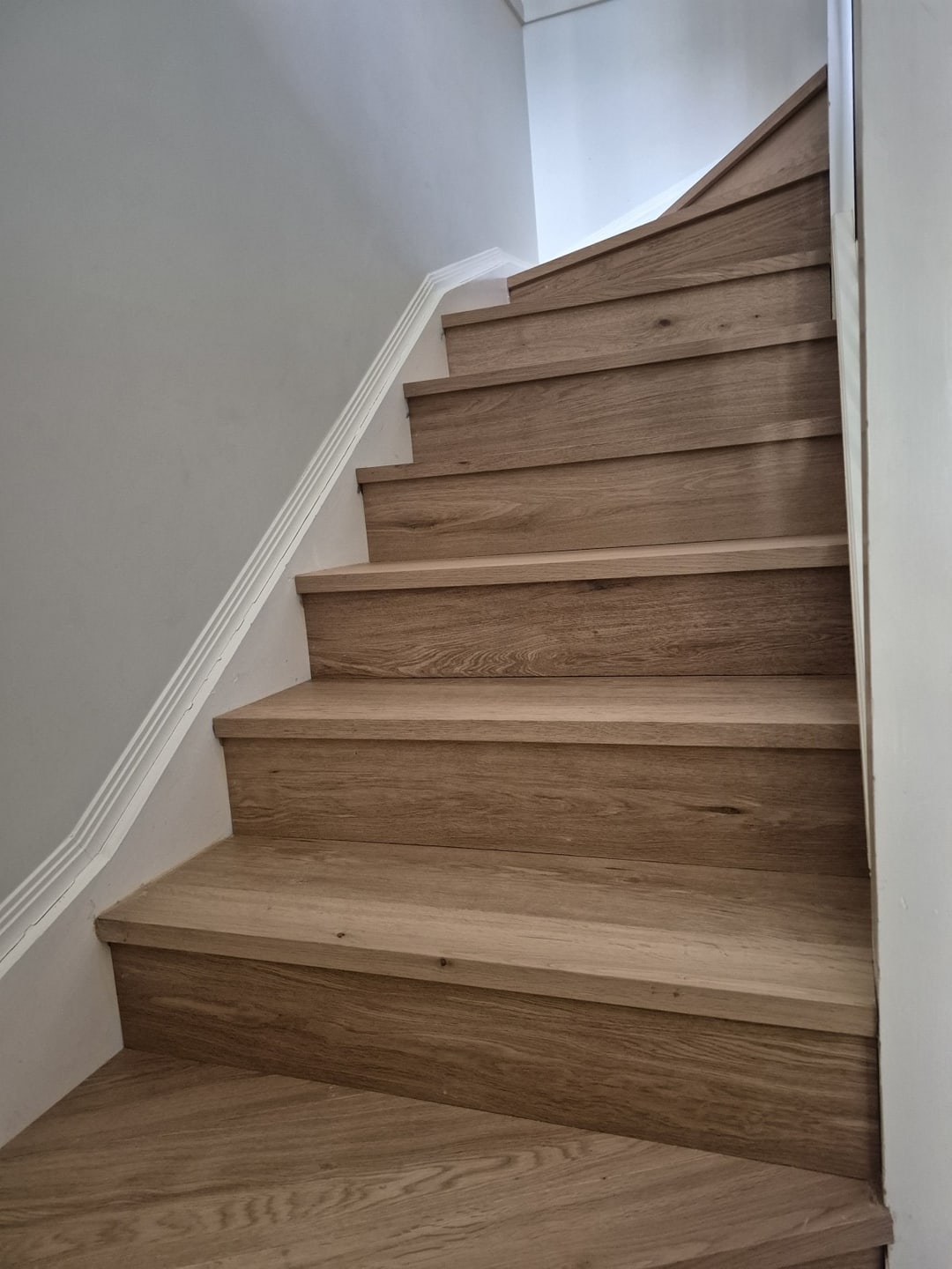 Engineered oak stairs turning up toward the landing, Brisbane